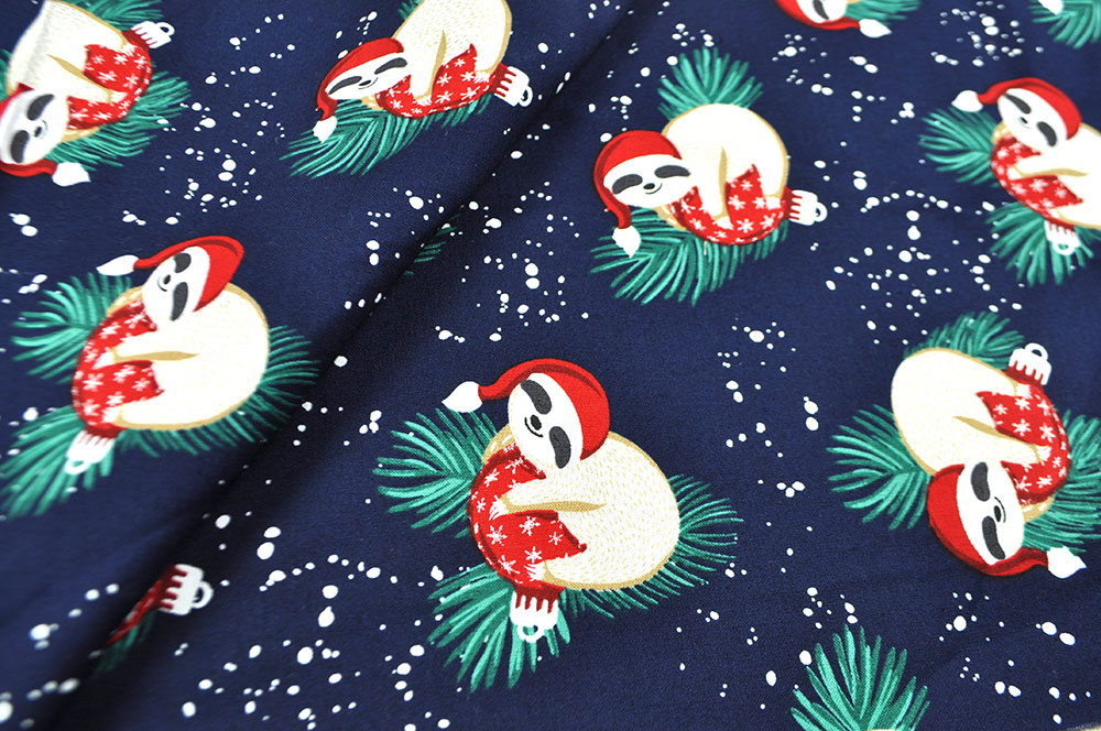 Weihnachtsstoff Baumwolle - Faultier - Nachtblau 