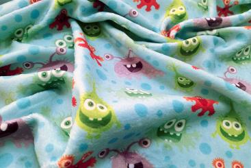 Wellness-Fleece - Lustige Monster Hellblau