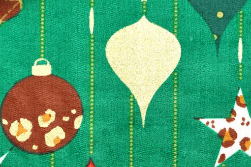 Weihnachtsstoff aus Baumwolle mit glänzenden Motiven