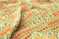 farbenfrohes Muster im Ethno / Indianer Style auf warmen Fleece Stoff auf heller Grundware