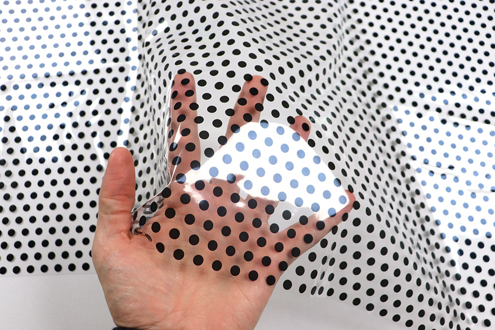 Transparenter Folienstoff - Tupfen 