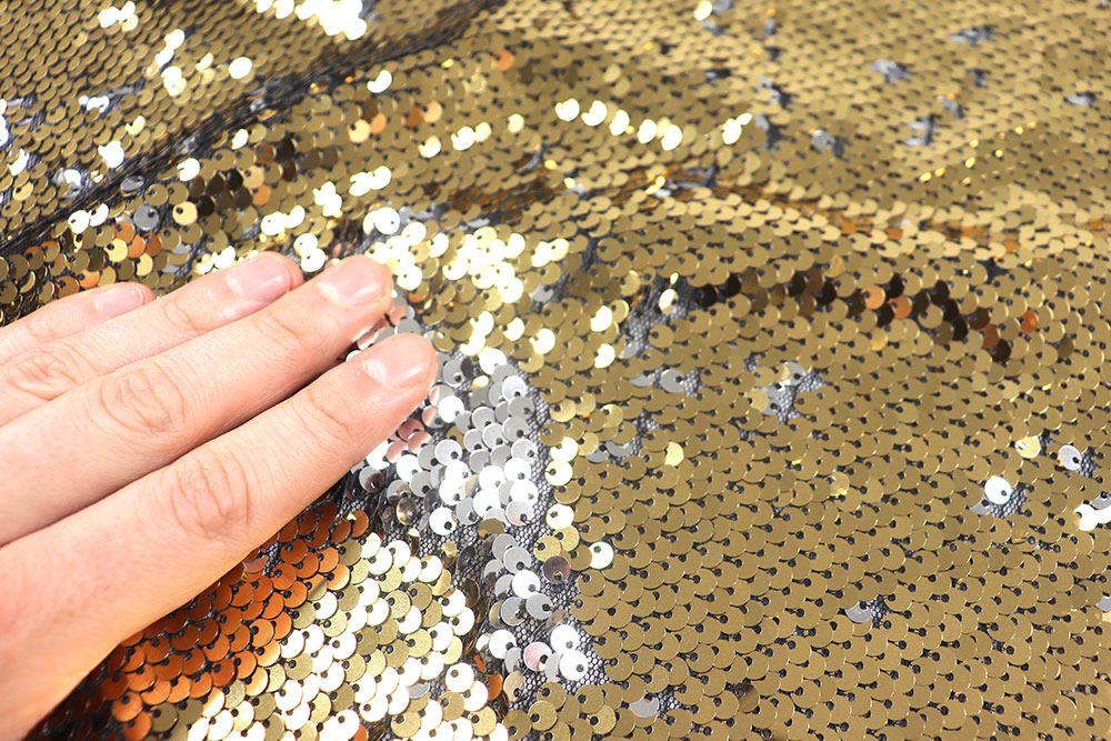 Wende-Pailletten-Stoff - Gold/Silber - B-Ware 