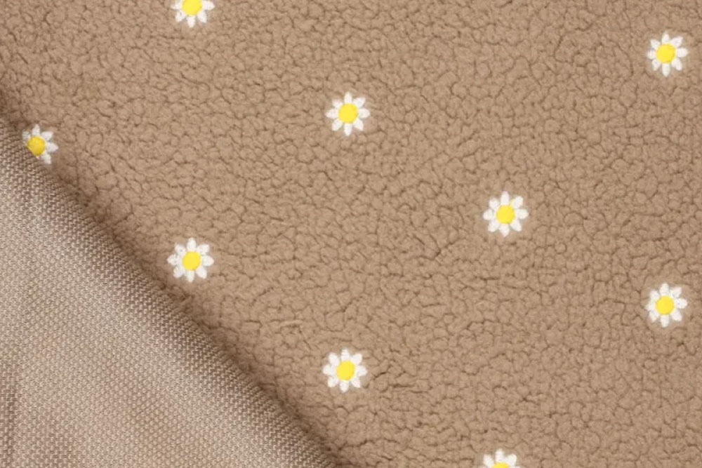 Sherpa-Fleece bestickt - Daisy