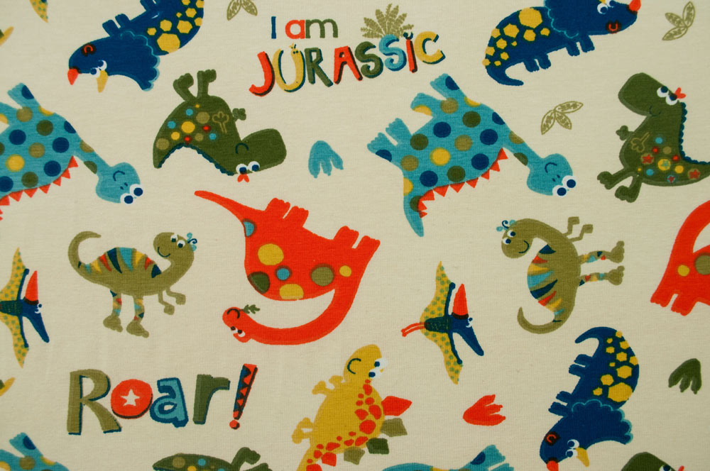 Kinder-Jerseystoff - Dinoparty - Creme