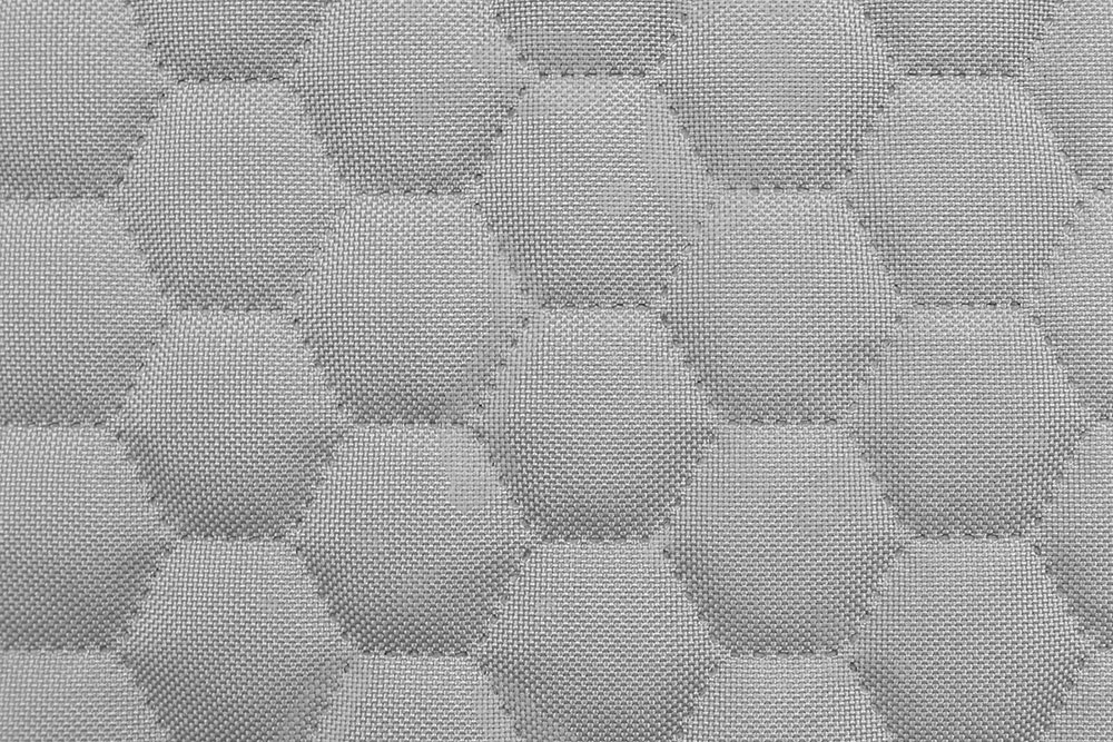 Polyesterstoff - reißfest und wasserabweisend - Bienenwaben-Stepp