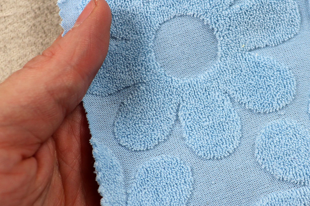 Frottee-Jacquard - Blümchen - Hellblau