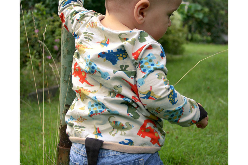 Kinder-Jerseystoff - Dinoparty - Creme