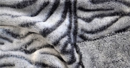 Wellness-Fleece-Stoff mit Zebra-Muster