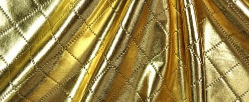 Glänzender Stepp-Stoff in Gold